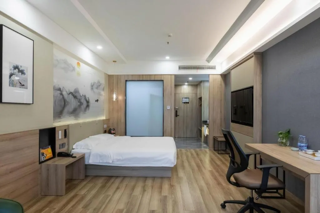 Bed in VX Hotel Jiangsu Taizhou Xinghua RT-Mart