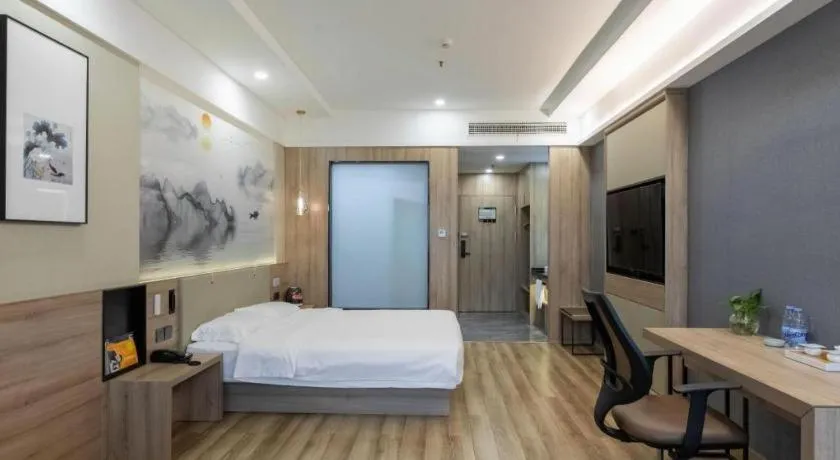 Bed in VX Hotel Jiangsu Taizhou Xinghua RT-Mart