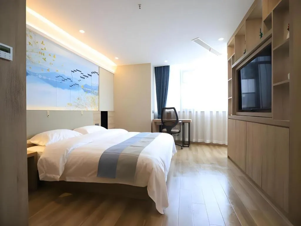 Bed in VX Hotel Jiangsu Taizhou Xinghua RT-Mart