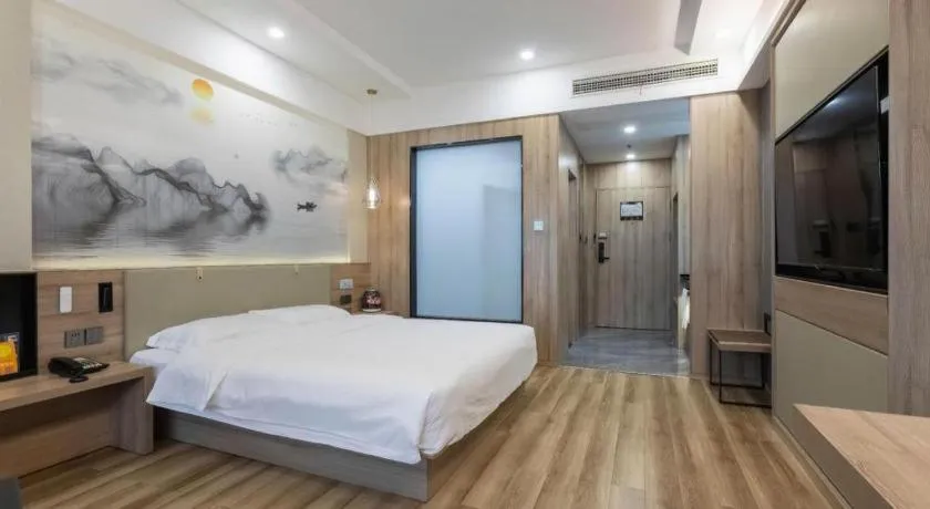 Bed in VX Hotel Jiangsu Taizhou Xinghua RT-Mart