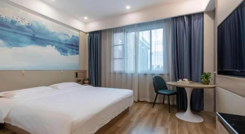 Bed in VX Hotel Jiangsu Taizhou Xinghua RT-Mart