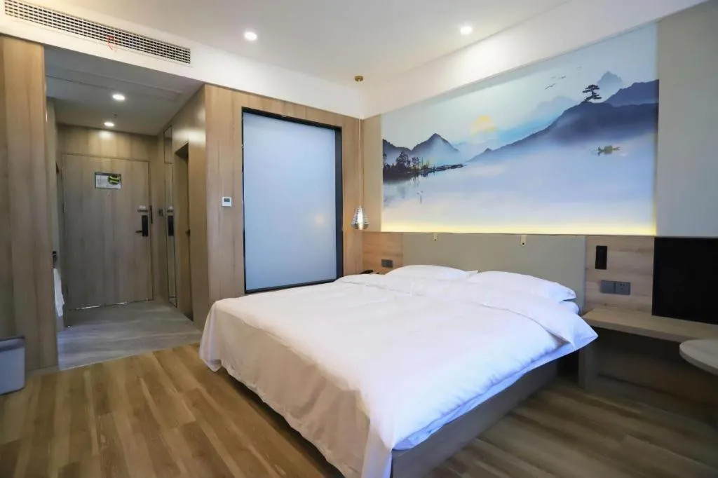 Bed in VX Hotel Jiangsu Taizhou Xinghua RT-Mart