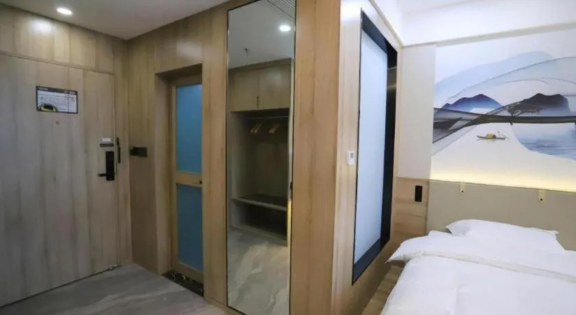 Bed in VX Hotel Jiangsu Taizhou Xinghua RT-Mart