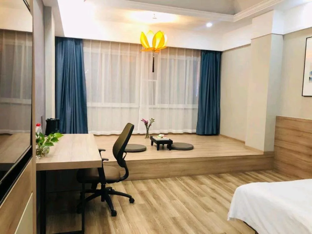 Bed in VX Hotel Jiangsu Taizhou Xinghua RT-Mart