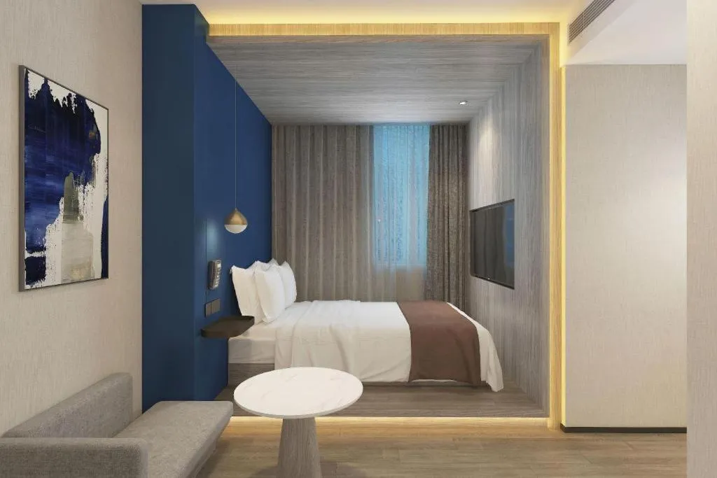 Bed in Gya Hotel Wuxi Hubin Commercial Street Tai Lake Scenic Area