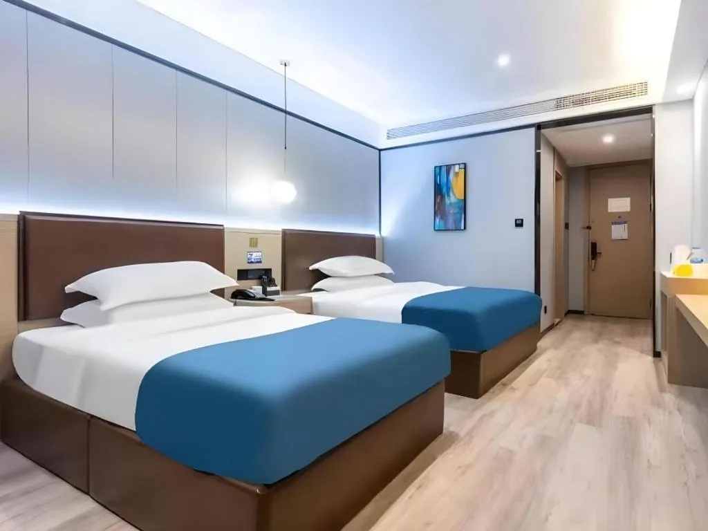 Bed in Gya Hotel Wuxi Hubin Commercial Street Tai Lake Scenic Area