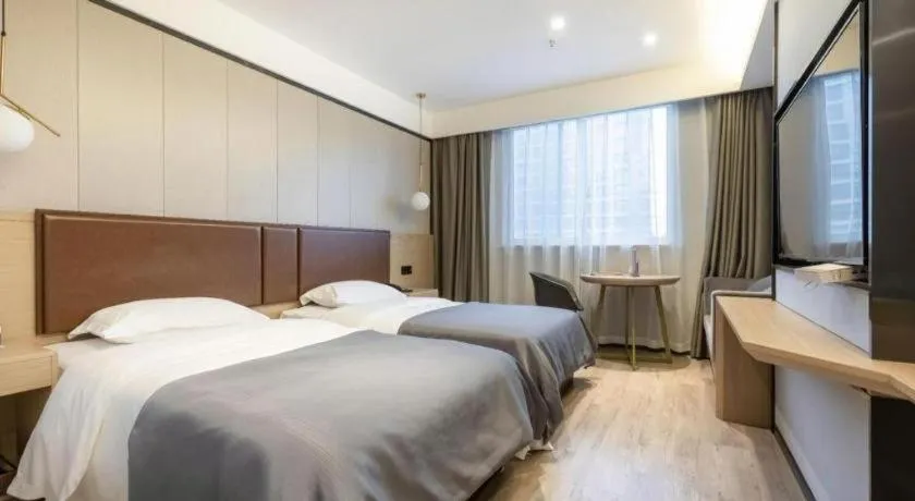 Bed in Gya Hotel Wuxi Hubin Commercial Street Tai Lake Scenic Area