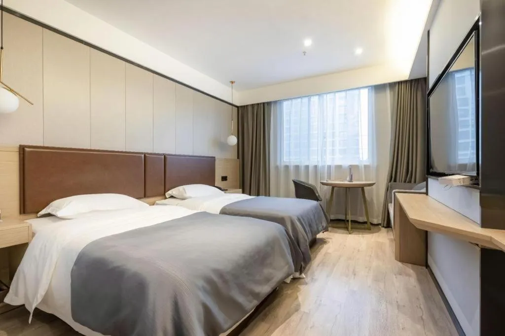 Bed in Gya Hotel Wuxi Hubin Commercial Street Tai Lake Scenic Area