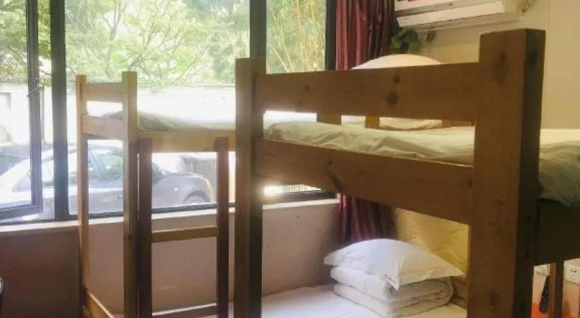 Bed in Shell Hotel Shanghai Expo Changqing Road Metro Station