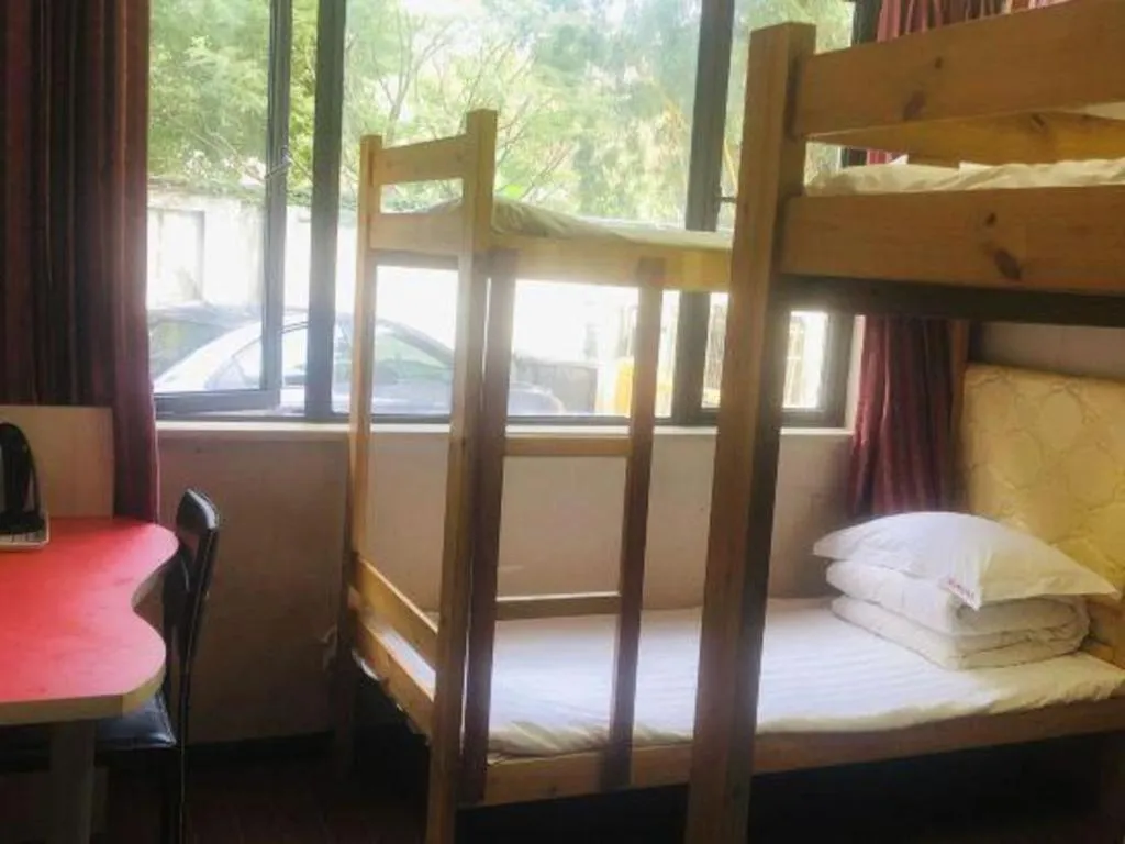 Bed in Shell Hotel Shanghai Expo Changqing Road Metro Station