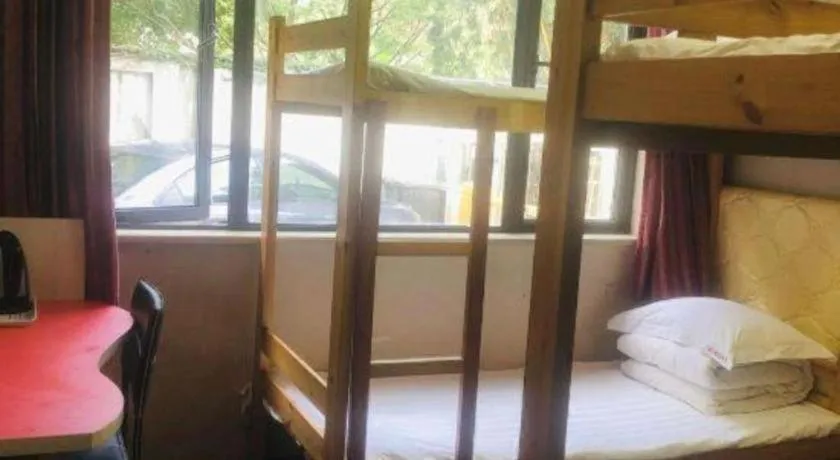 Bed in Shell Hotel Shanghai Expo Changqing Road Metro Station