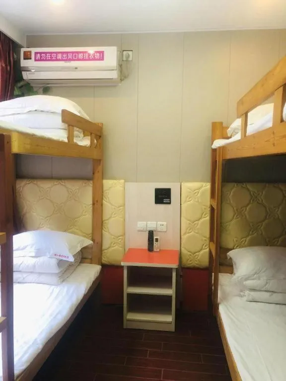 Bed in Shell Hotel Shanghai Expo Changqing Road Metro Station