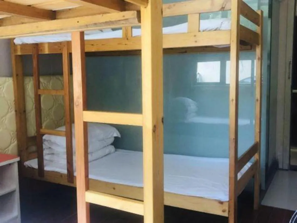 Bed in Shell Hotel Shanghai Expo Changqing Road Metro Station