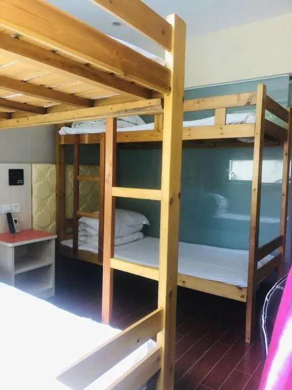 Bed in Shell Hotel Shanghai Expo Changqing Road Metro Station