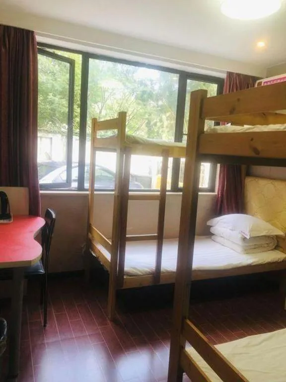 Bed in Shell Hotel Shanghai Expo Changqing Road Metro Station