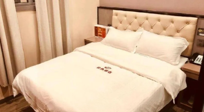 Bed in Shell Hotel Shanghai Jinshan Wanda Plaza