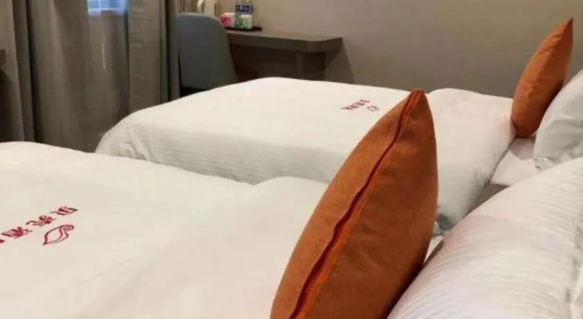 Bed in Shell Hotel Shanghai Jinshan Wanda Plaza
