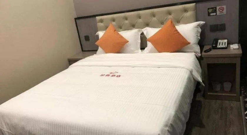 Bed in Shell Hotel Shanghai Jinshan Wanda Plaza