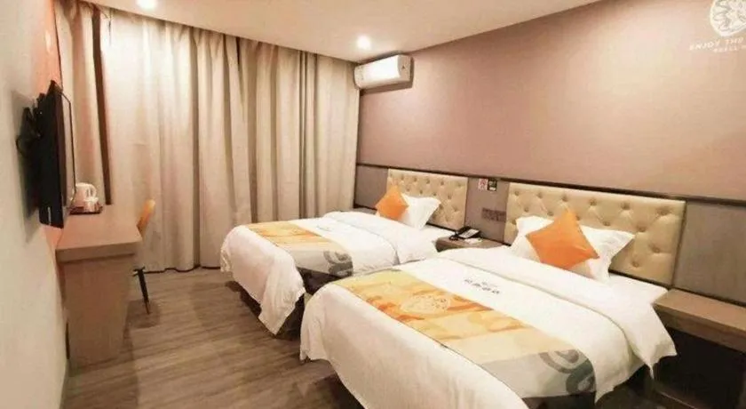 Bed in Shell Hotel Shanghai Jinshan Wanda Plaza