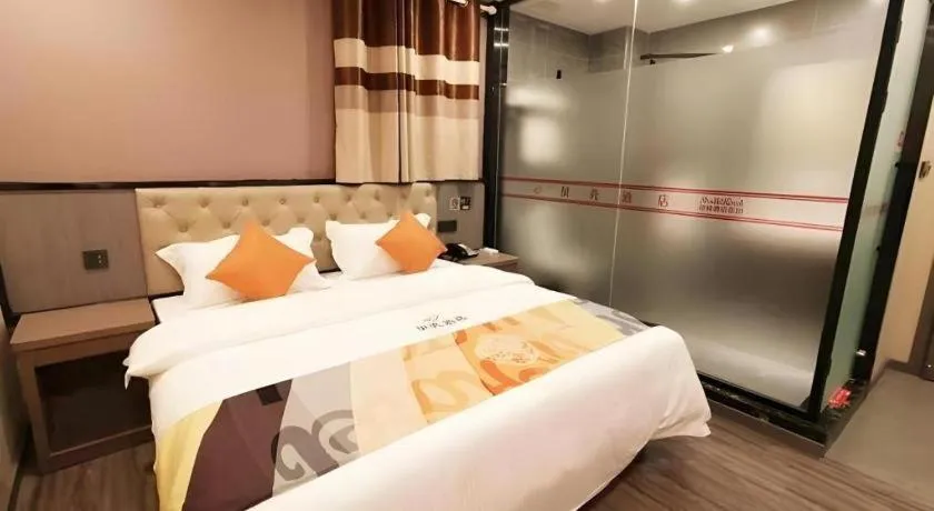Bed in Shell Hotel Shanghai Jinshan Wanda Plaza