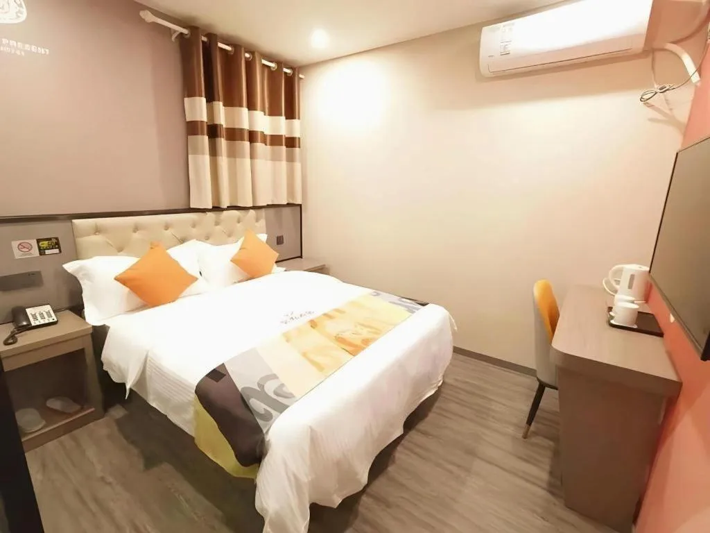 Bed in Shell Hotel Shanghai Jinshan Wanda Plaza