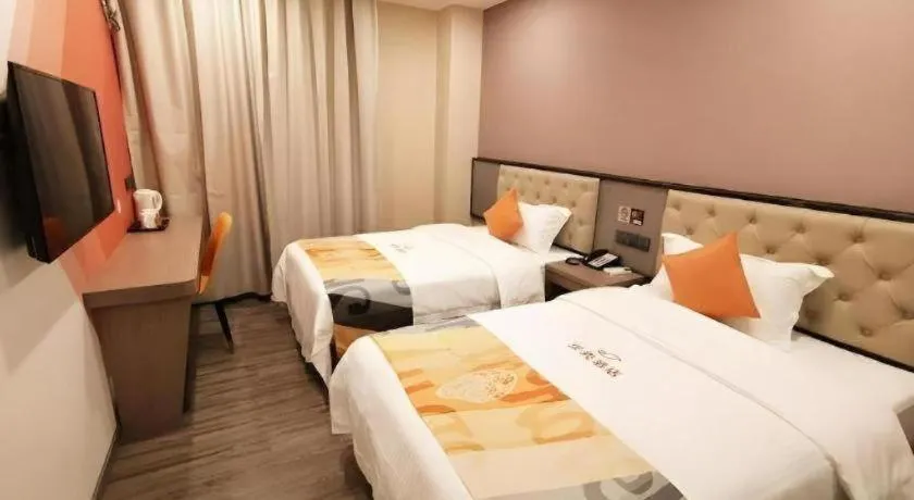 Bed in Shell Hotel Shanghai Jinshan Wanda Plaza