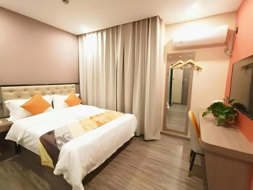 Bed in Shell Hotel Shanghai Jinshan Wanda Plaza
