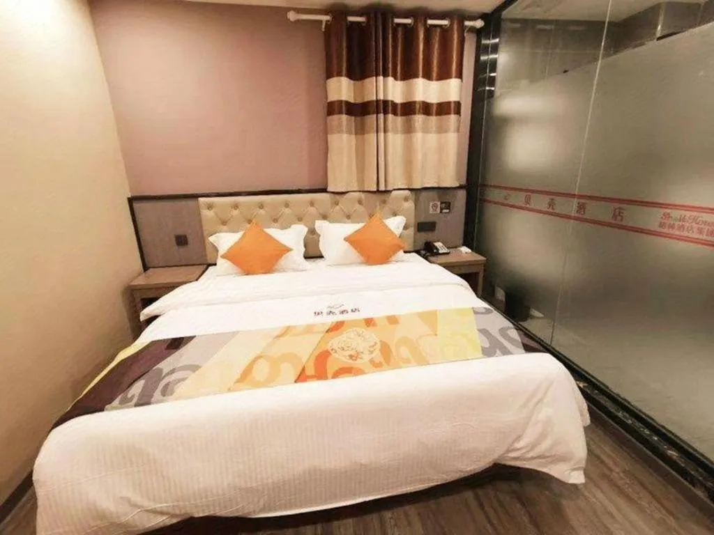 Bed in Shell Hotel Shanghai Jinshan Wanda Plaza