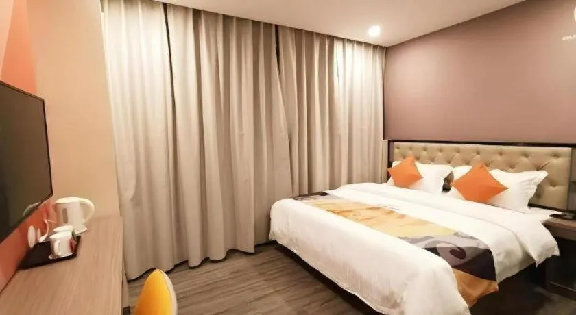 Bed in Shell Hotel Shanghai Jinshan Wanda Plaza