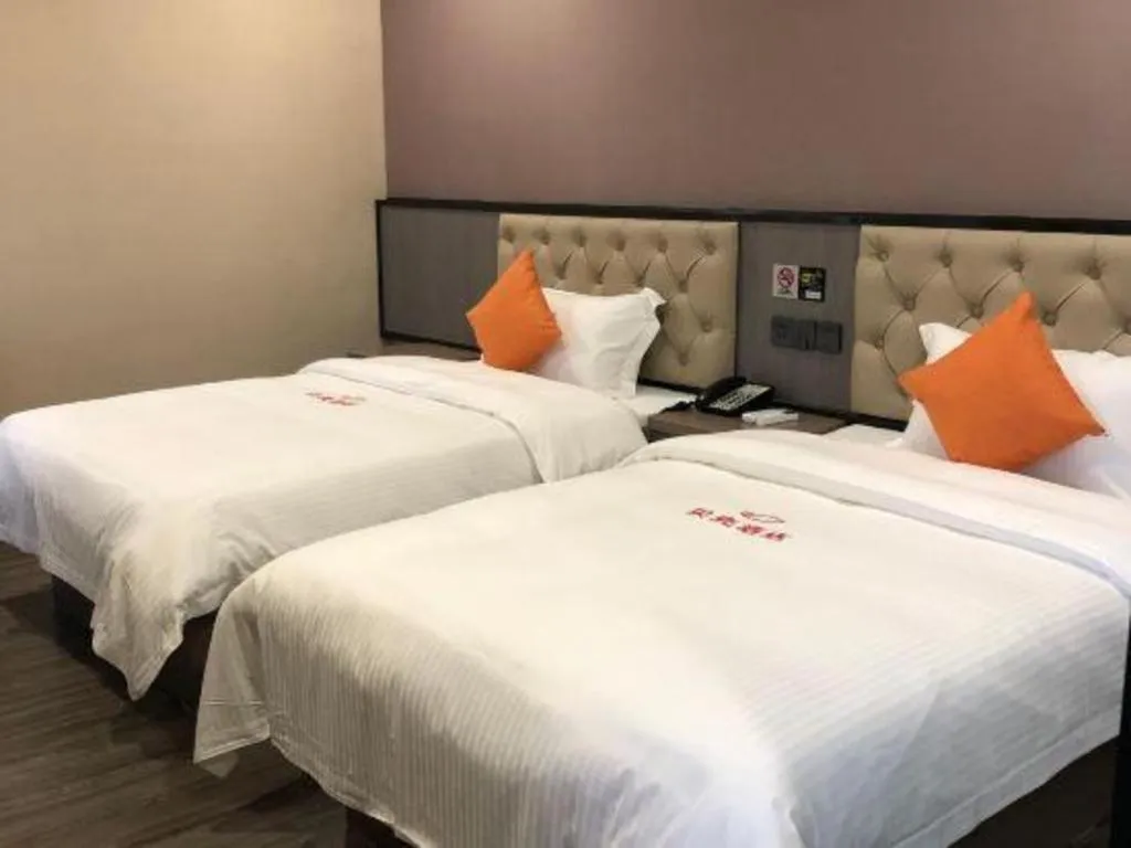 Bed in Shell Hotel Shanghai Jinshan Wanda Plaza