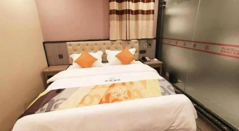 Bed in Shell Hotel Shanghai Jinshan Wanda Plaza