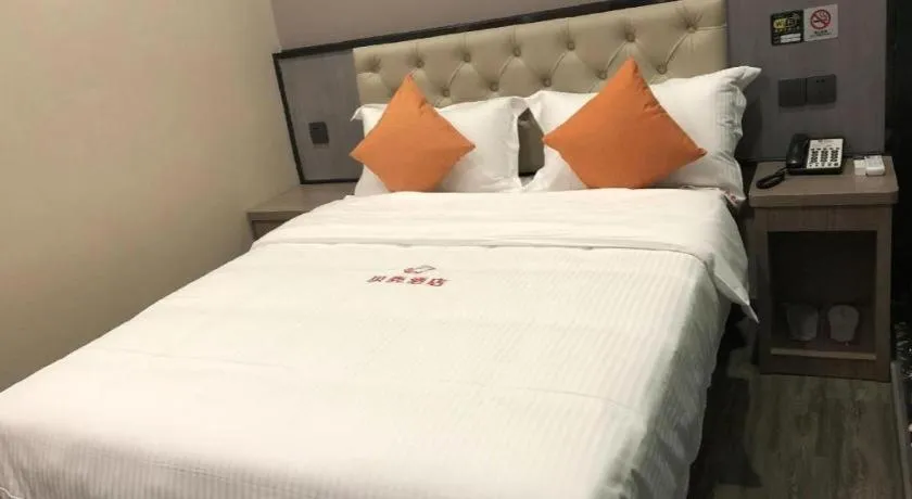 Bed in Shell Hotel Shanghai Jinshan Wanda Plaza