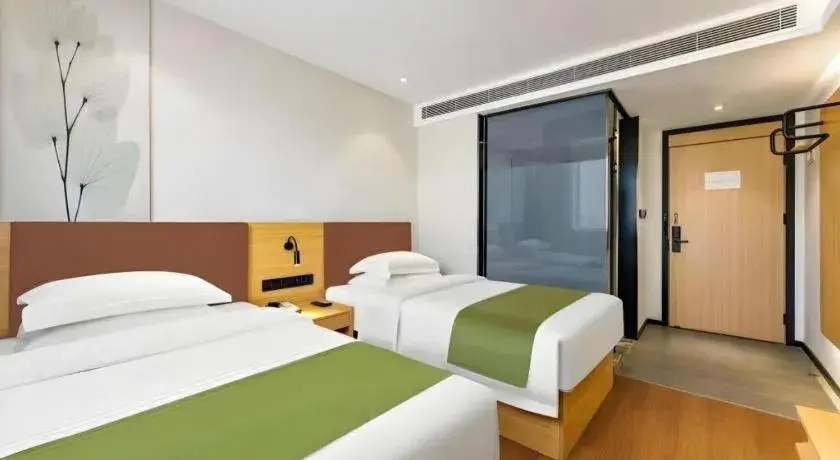 Bed in GreenTree Inn Express Datong High-Speed Railway Station Old City Wall Bed in GreenTree Inn Express Datong High-Speed Railway Station Old City Wall