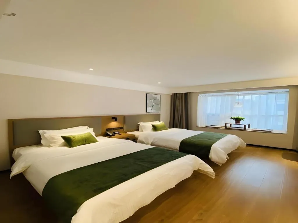 Bed in GreenTree Inn Luoyang Railway Station Wangfujing Wangcheng Park