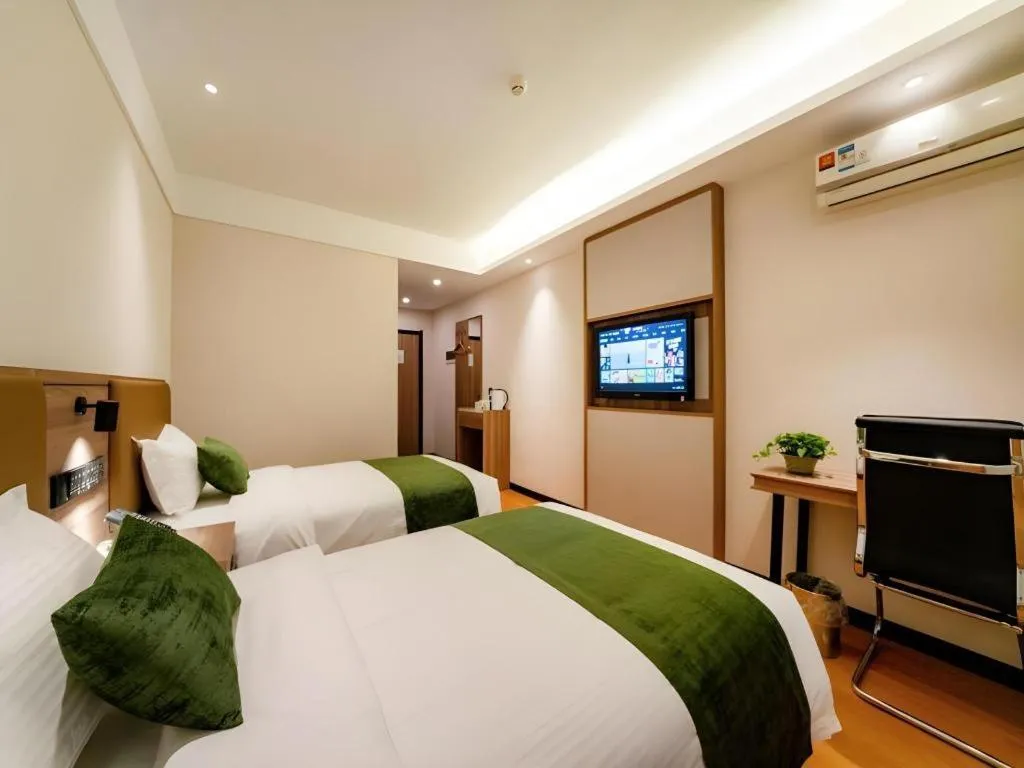 Bed in GreenTree Inn Express Hebei Tangshan Guyan District Xinguang Road