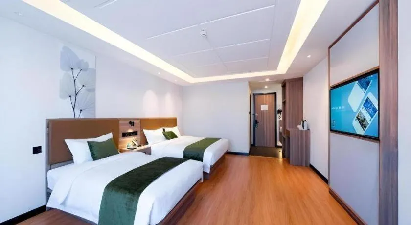 Bed in GreenTree Inn Express Hebei Tangshan Guyan District Xinguang Road