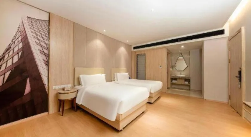 Bed in GreenTree Eastern Hotel Shenzhen Nanshan District Qianhai Free Trade Zone Lilin Metro Station