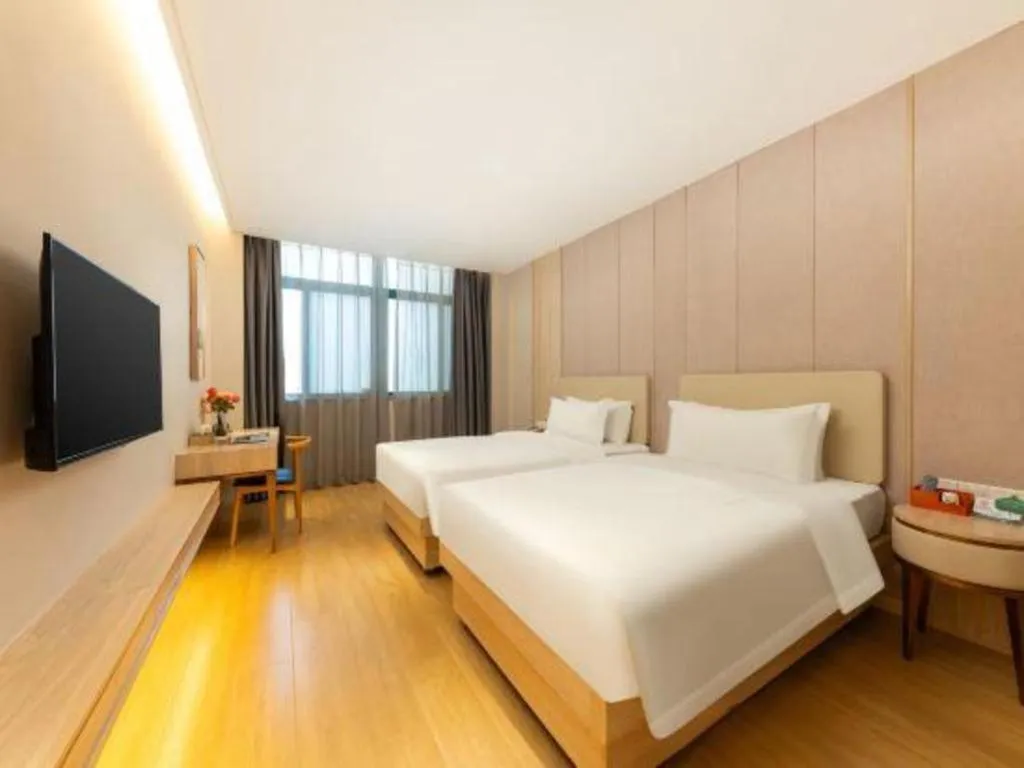 Bed in GreenTree Eastern Hotel Shenzhen Nanshan District Qianhai Free Trade Zone Lilin Metro Station