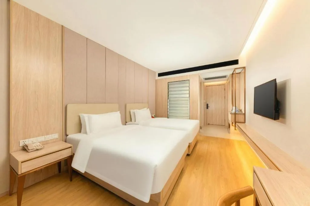 Bed in GreenTree Eastern Hotel Shenzhen Nanshan District Qianhai Free Trade Zone Lilin Metro Station