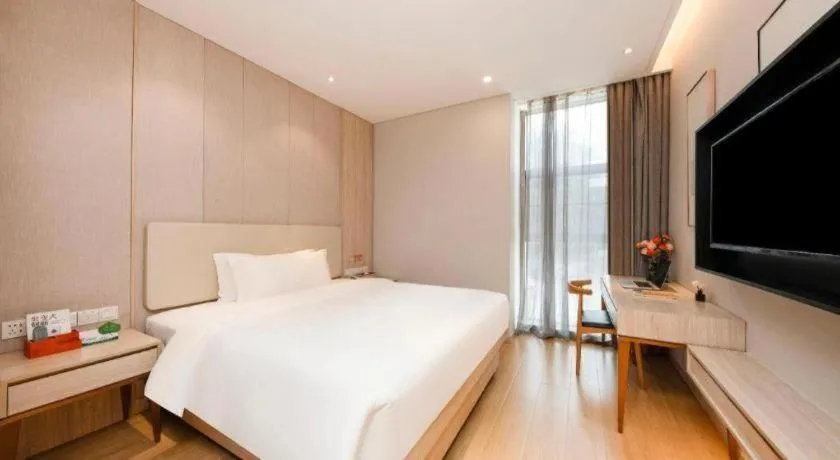 Bed in GreenTree Eastern Hotel Shenzhen Nanshan District Qianhai Free Trade Zone Lilin Metro Station