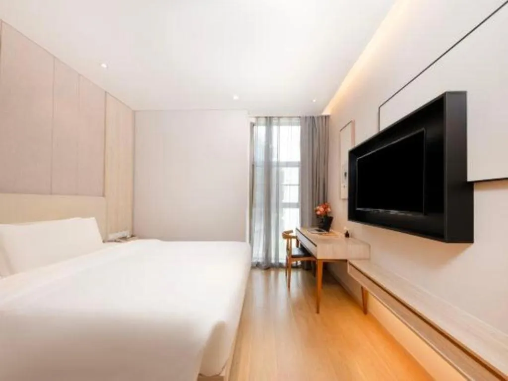 Bed in GreenTree Eastern Hotel Shenzhen Nanshan District Qianhai Free Trade Zone Lilin Metro Station