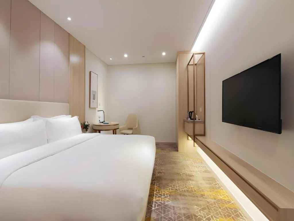 Bed in GreenTree Eastern Hotel Shenzhen Nanshan District Qianhai Free Trade Zone Lilin Metro Station