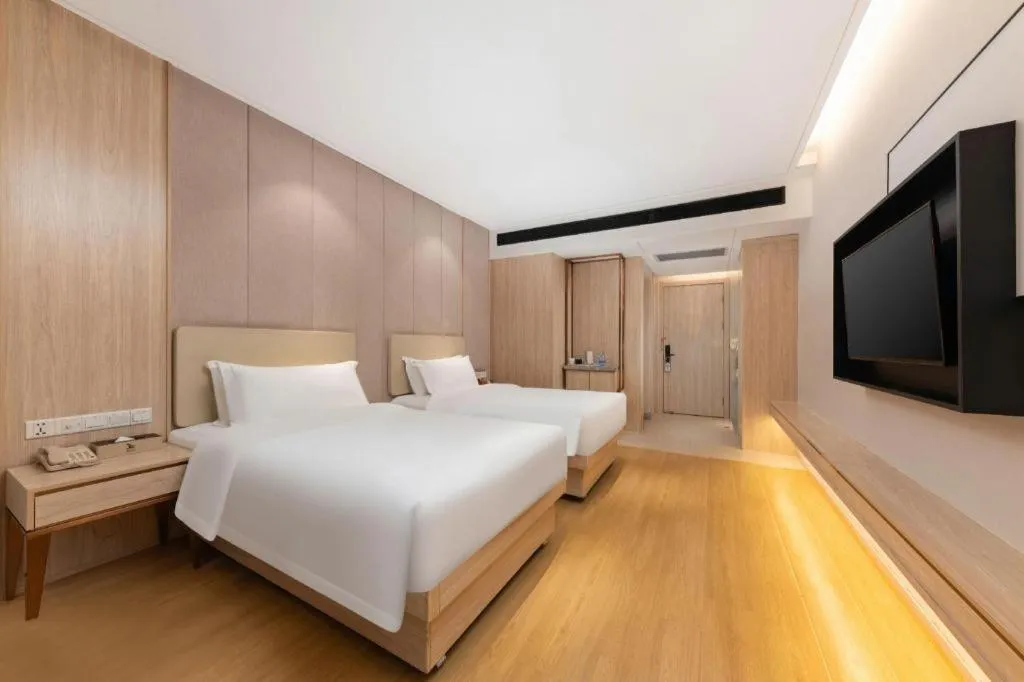 Bed in GreenTree Eastern Hotel Shenzhen Nanshan District Qianhai Free Trade Zone Lilin Metro Station