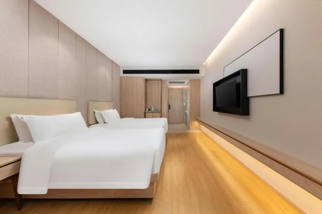 Bed in GreenTree Eastern Hotel Shenzhen Nanshan District Qianhai Free Trade Zone Lilin Metro Station