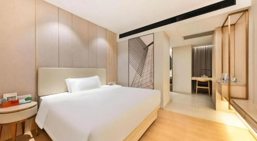 Bed in GreenTree Eastern Hotel Shenzhen Nanshan District Qianhai Free Trade Zone Lilin Metro Station