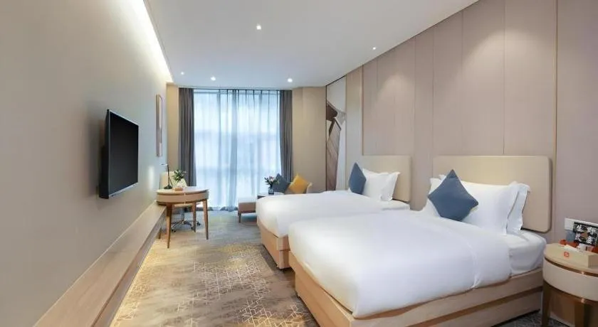 Bed in GreenTree Eastern Hotel Shenzhen Nanshan District Qianhai Free Trade Zone Lilin Metro Station