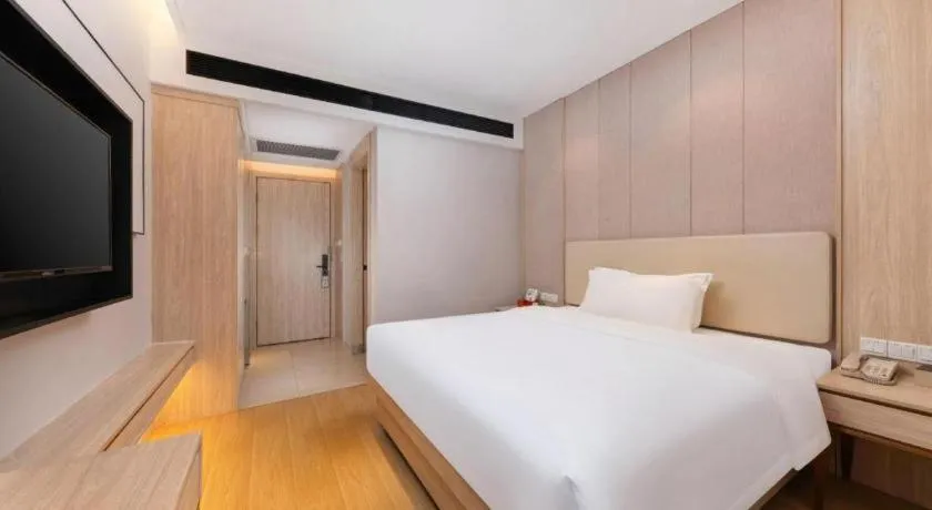Bed in GreenTree Eastern Hotel Shenzhen Nanshan District Qianhai Free Trade Zone Lilin Metro Station