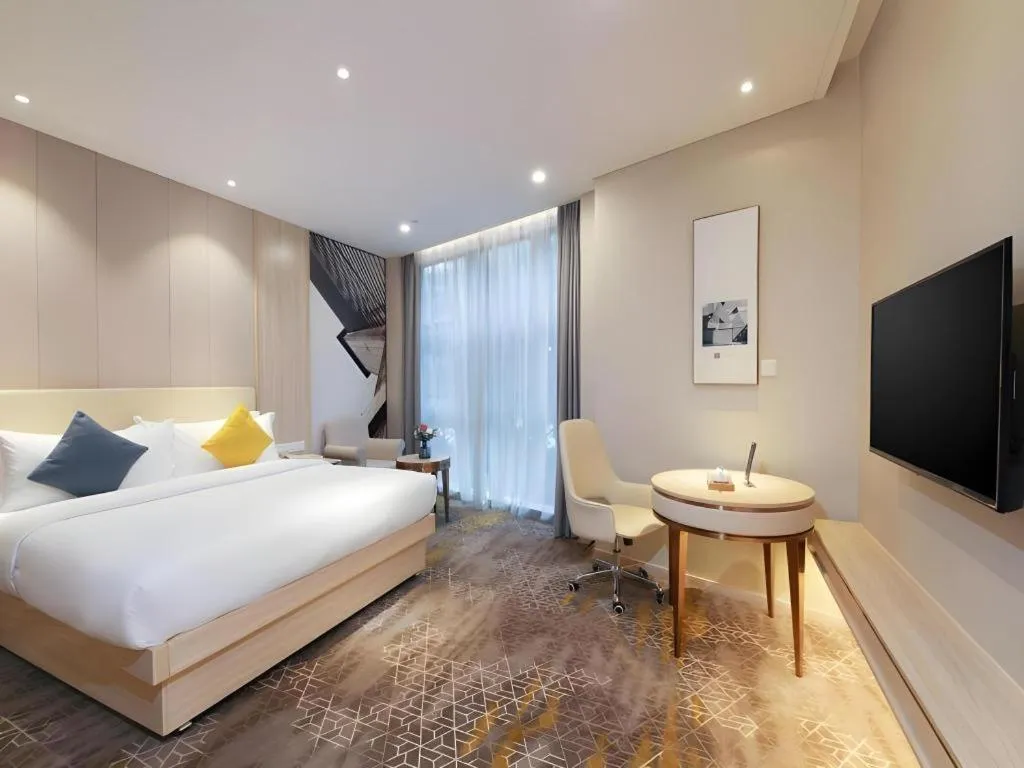 Bed in GreenTree Eastern Hotel Shenzhen Nanshan District Qianhai Free Trade Zone Lilin Metro Station