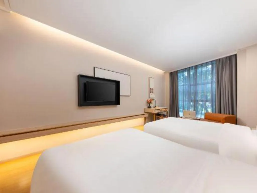 Bed in GreenTree Eastern Hotel Shenzhen Nanshan District Qianhai Free Trade Zone Lilin Metro Station