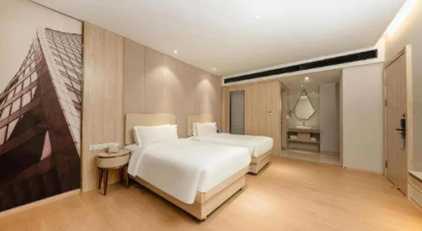 Bed in GreenTree Eastern Hotel Shenzhen Nanshan District Qianhai Free Trade Zone Lilin Metro Station